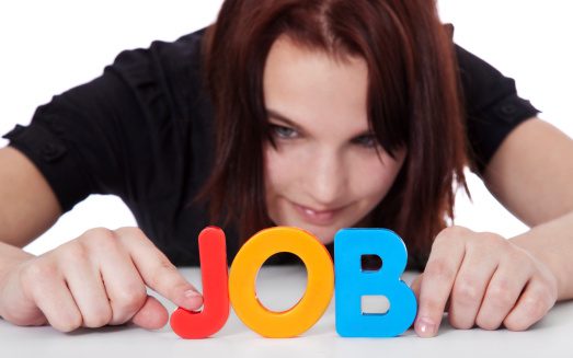 Woman holding a letter toy